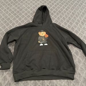 Black hoodie with bear on it